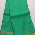 Kota Doria Silk Saree is on the floor