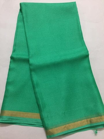 Kota Doria Silk Saree is on the floor