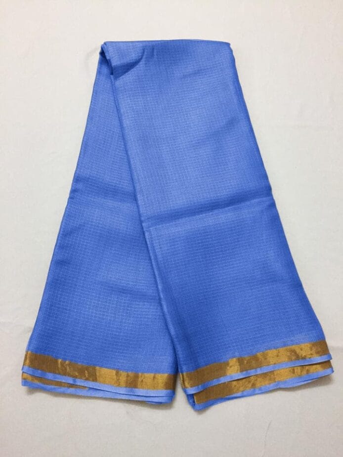 Kota Doria Silk Saree is on the floor