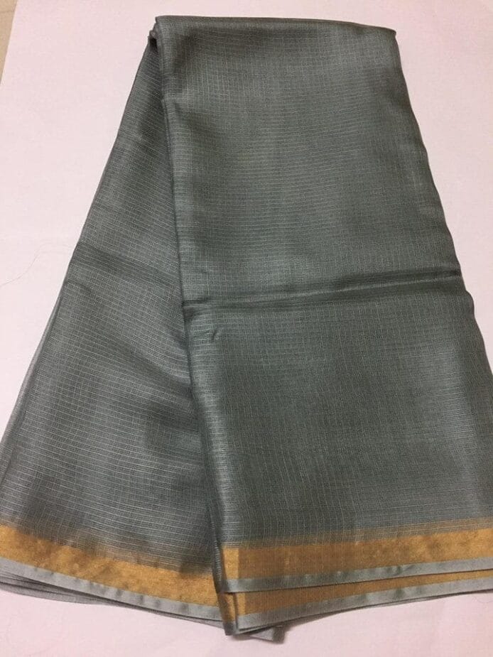 Kota Doria Silk Saree is on the floor