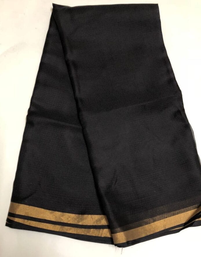 Kota Doria Silk Saree is on the floor