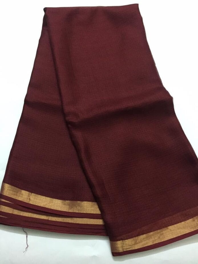 Kota Doria Silk Saree is on the floor