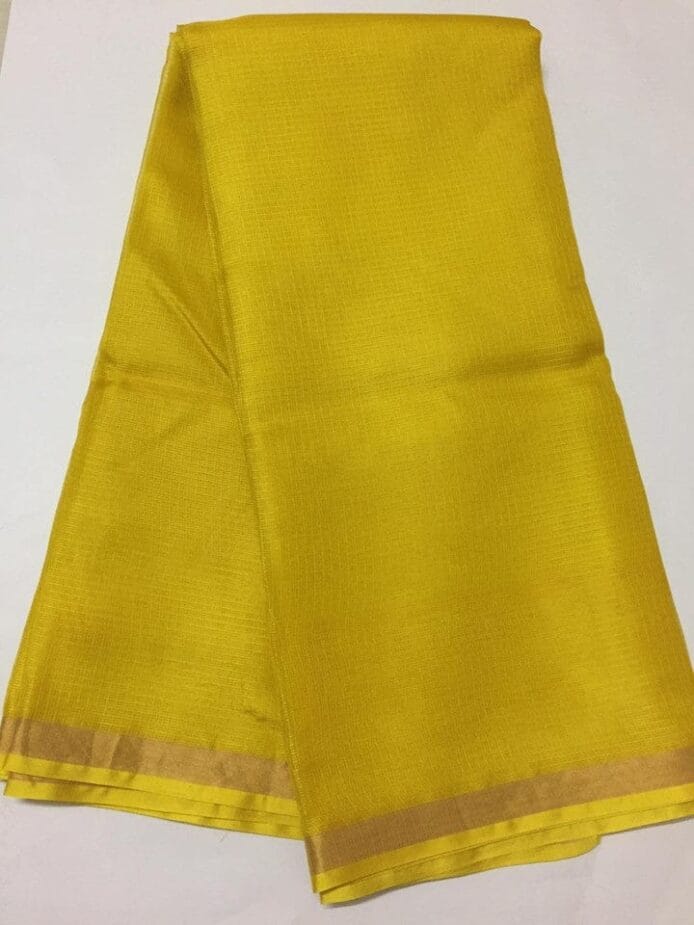 Kota Doria Silk Saree is on the floor