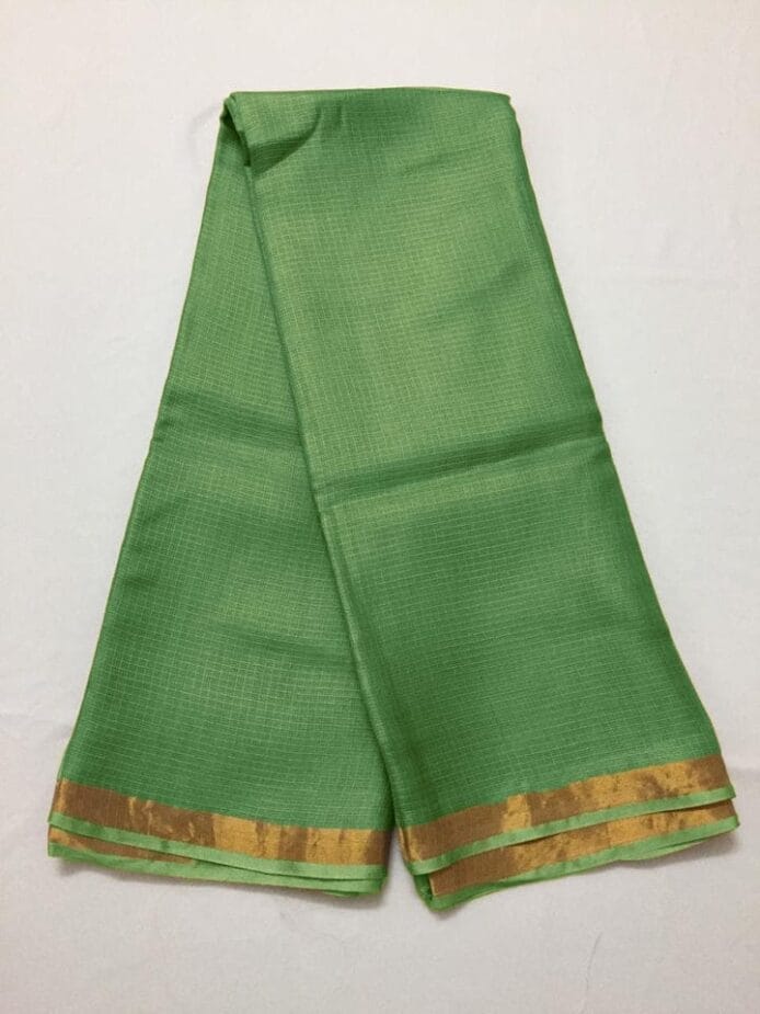 Kota Doria Silk Saree is on the floor