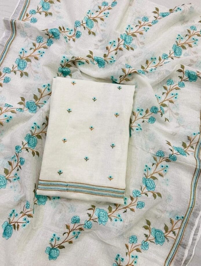 White Embroidered Salwar Kameez on the floor