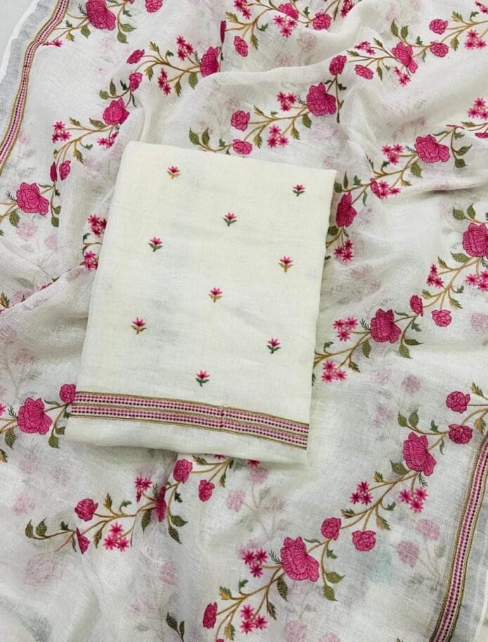 White Embroidered Salwar Kameez on the floor