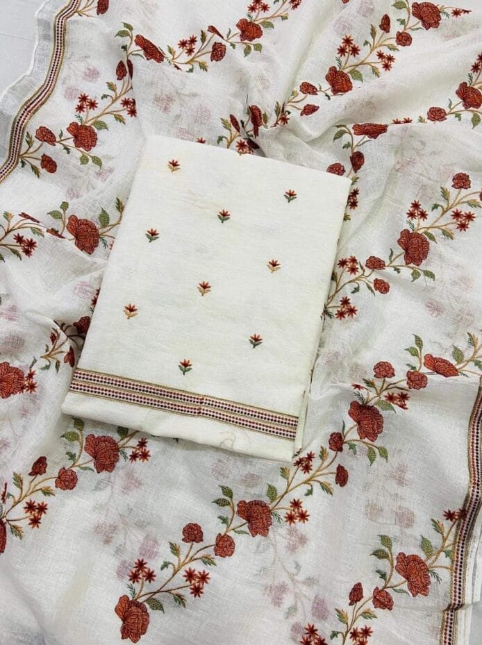 White Embroidered Salwar Kameez on the floor