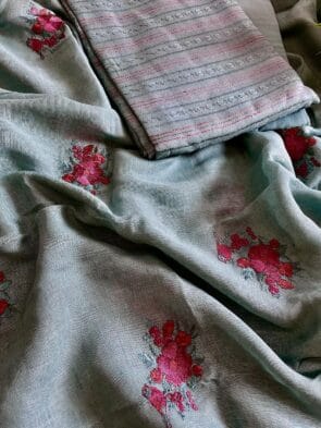 In the picture Linen Embroidery Salwar Suit set with plant pot