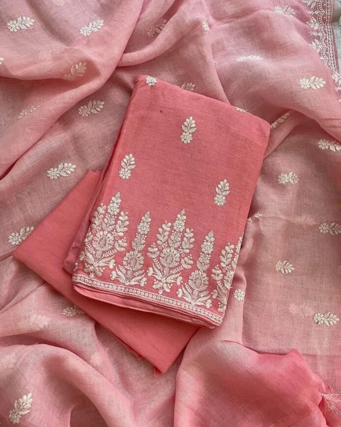 Linen Embroidery on Salwar Suits on floor with plant pot