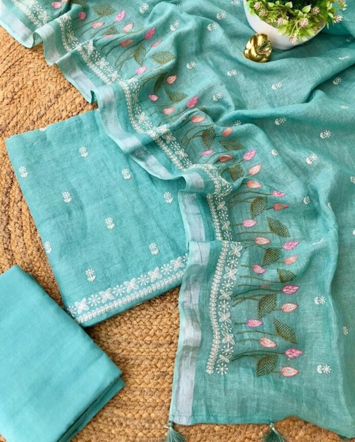 Embroidered Salwar Kameez on the floor with top