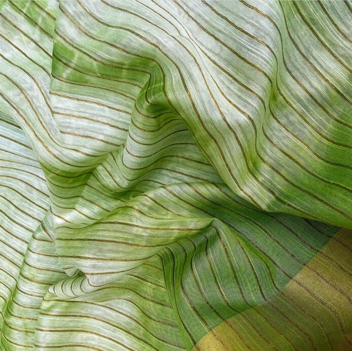 Kota Silk Sarees on hanger with plant leaf