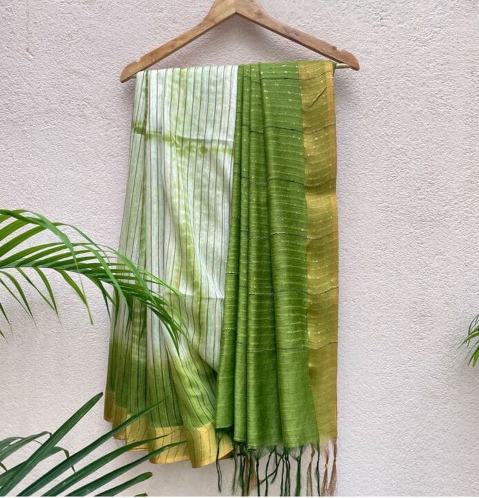 Kota Silk Sarees on hanger with plant leaf