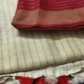Off-White Onam Sarees for Women on the floor