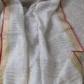 Onam sarees for women on the floor