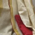 Off-White Onam Sarees for Women on the floor