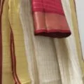 Off-White Onam Sarees for Women on the floor
