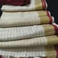 Off-White Onam Sarees for Women on the floor