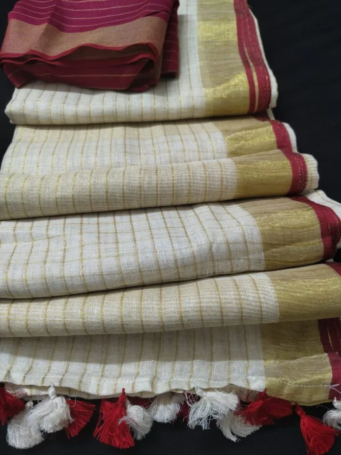 Off-White Onam Sarees for Women on the floor