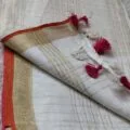 Onam sarees for women on the floor