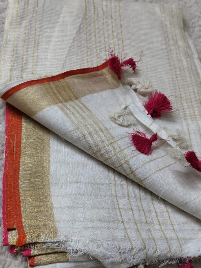 Onam sarees for women on the floor