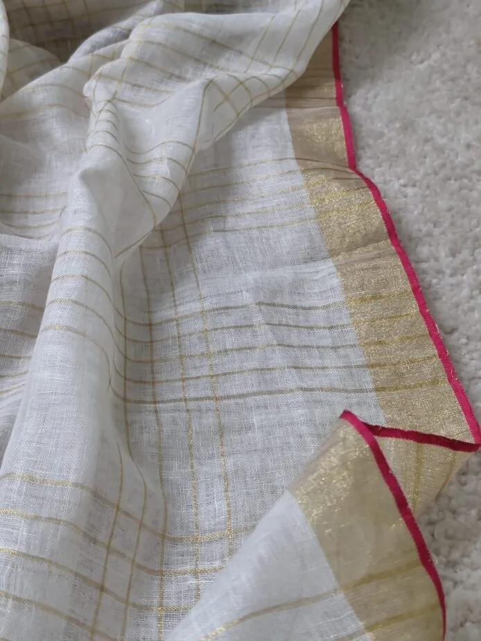 Onam sarees for women on the floor