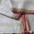 Onam sarees for women on the floor