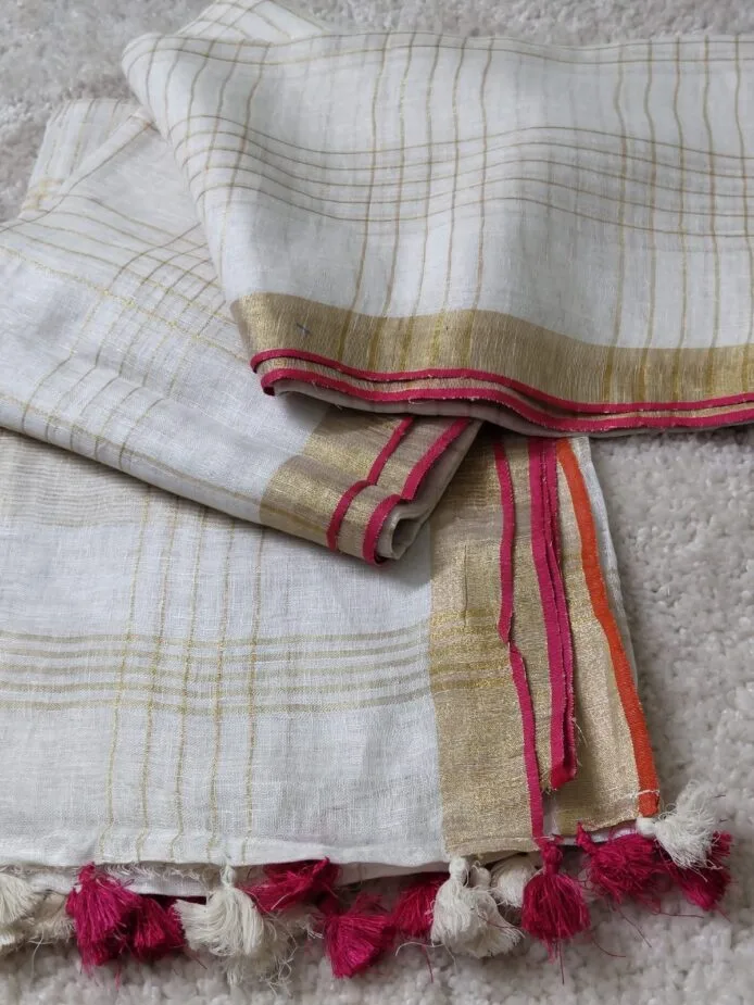 Onam sarees for women on the floor