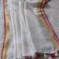 Onam sarees for women on the floor