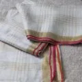 Onam sarees for women on the floor