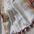 Onam sarees for women on the floor