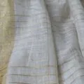Onam sarees for women on the floor