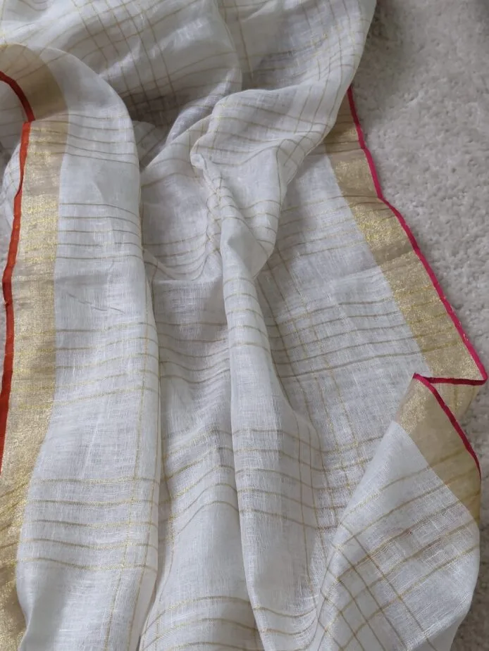 Onam sarees for women on the floor