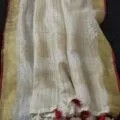 Off-White Onam Sarees for Women on the floor