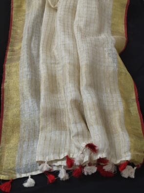 Off-White Onam Sarees for Women on the floor