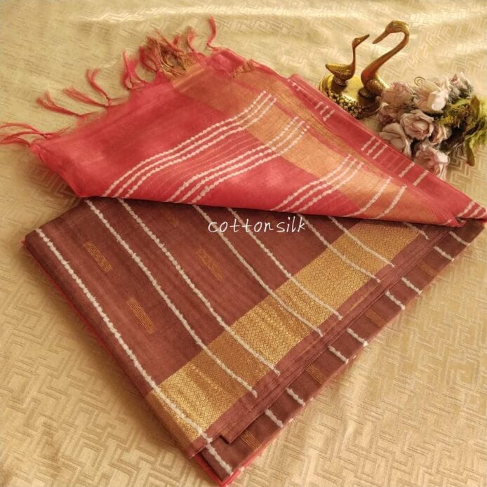 Stylish Semi Silk Sarees on the floor with pot