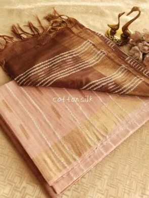 Stylish Semi Silk Sarees on the floor with pot