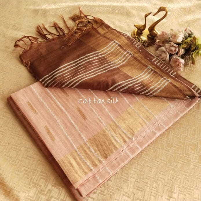 Stylish Semi Silk Sarees on the floor with pot