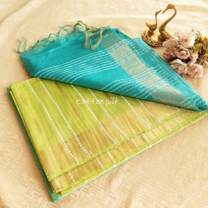 Stylish Semi Silk Sarees on the floor with pot
