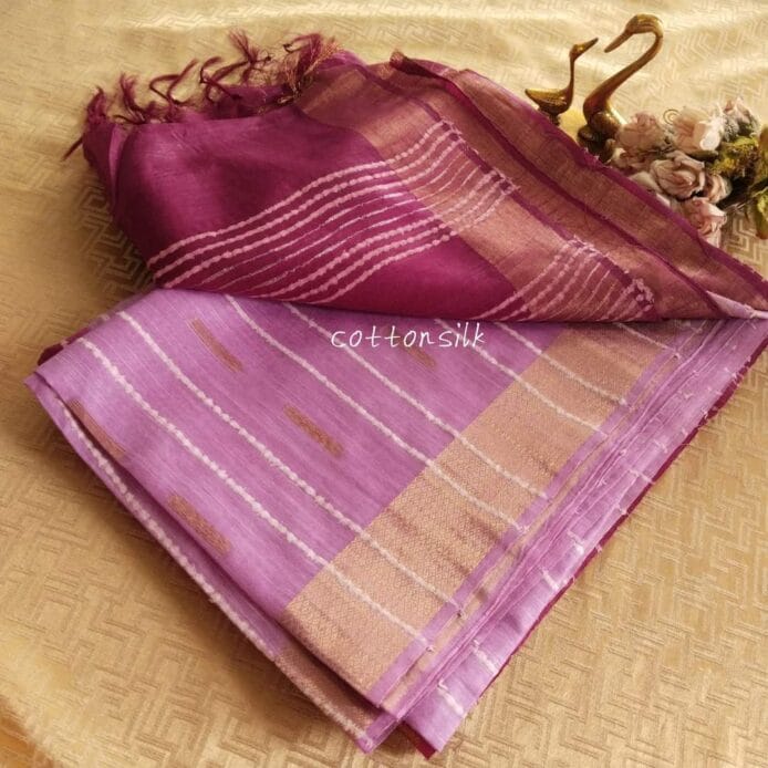 Stylish Semi Silk Sarees on the floor with pot