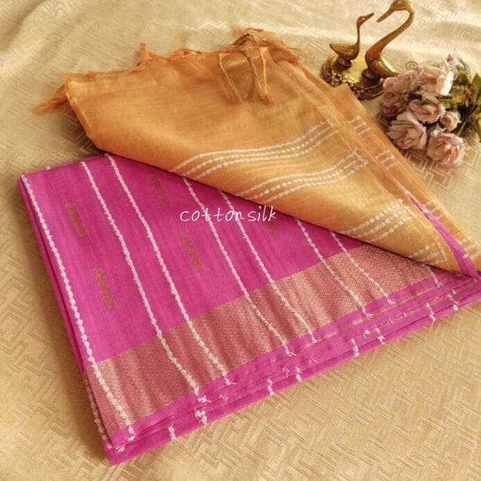 Stylish Semi Silk Sarees on the floor with pot