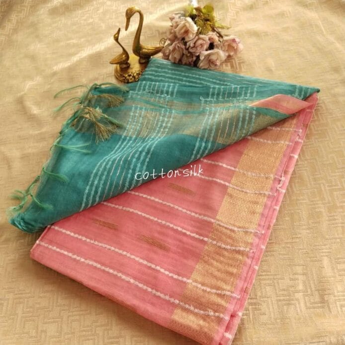Stylish Semi Silk Sarees on the floor with pot