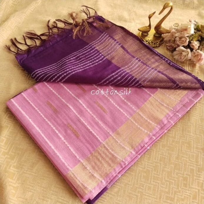 Stylish Semi Silk Sarees on the floor with pot