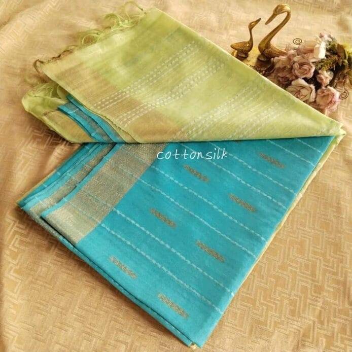 Stylish Semi Silk Sarees on the floor with pot