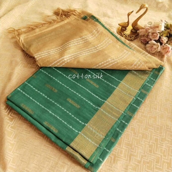 Stylish Semi Silk Sarees on the floor with pot