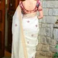 White Pure Linen Silk Saree with Intricate Embroidery Work, Model wear this saree
