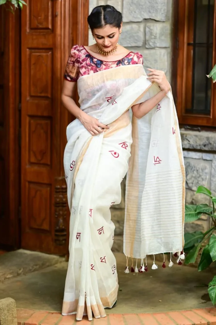 White Pure Linen Silk Saree with Intricate Embroidery Work, Model wear this saree