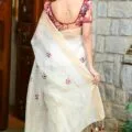 White Pure Linen Silk Saree with Intricate Embroidery Work, Model wear this saree