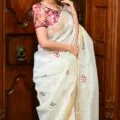 White Pure Linen Silk Saree with Intricate Embroidery Work, Model wear this saree