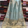 Tissue Linen Saree Golden Zari Border with Model and Some saree in background