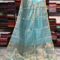 Tissue Linen Saree Golden Zari Border with Model and Some saree in background